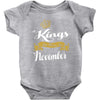 kings are born in november Baby Onesie